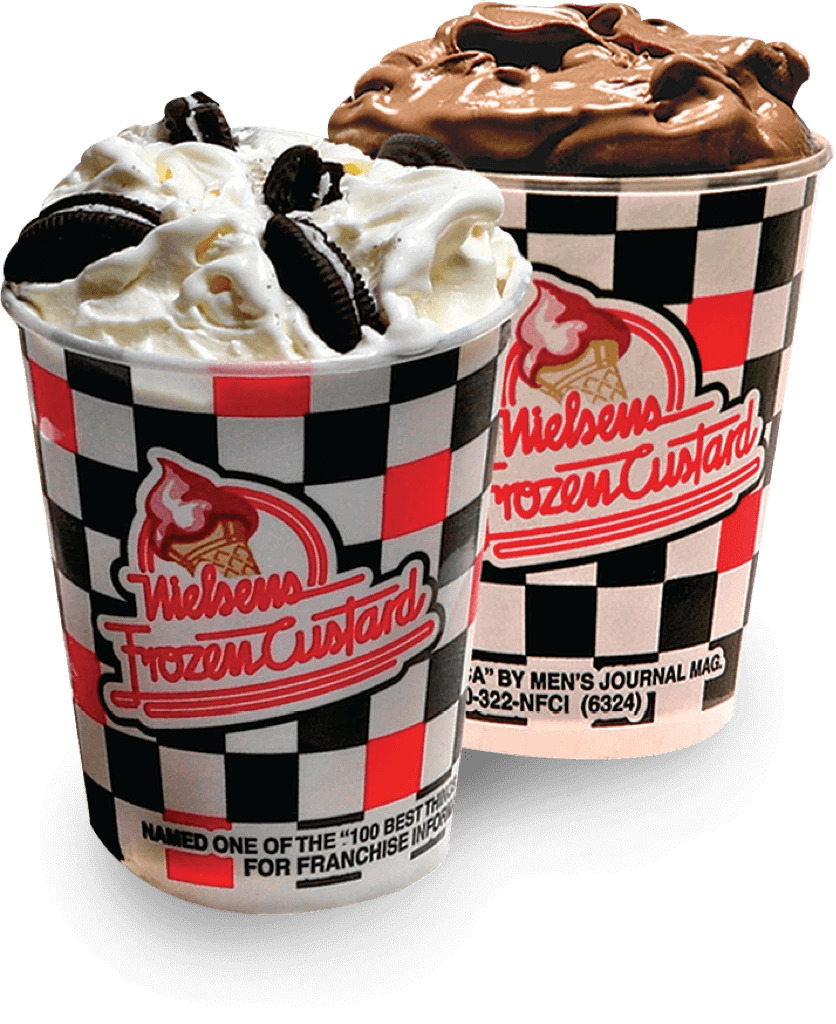 Two Nielsen's Frozen Custard cups with cookies and chocolate toppings.